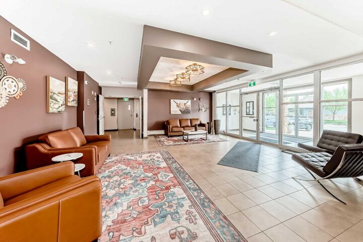 Property Photo:  207 Sunset Drive 111  AB T4C 0H7 