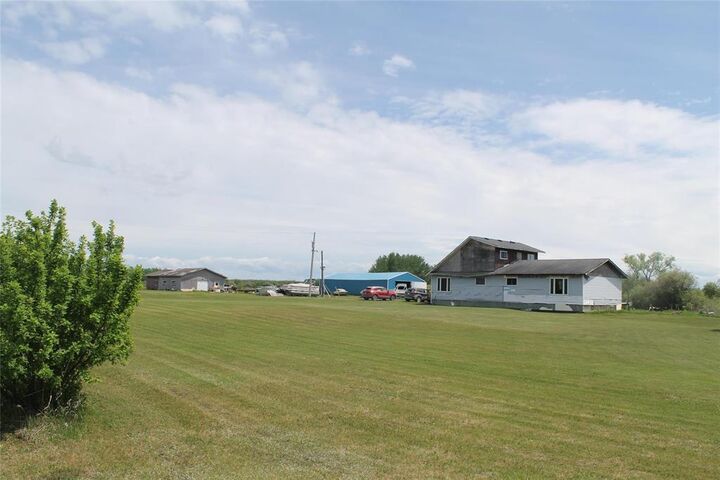 Property Photo:  102202 11 Highway  MB R0E 1V0 
