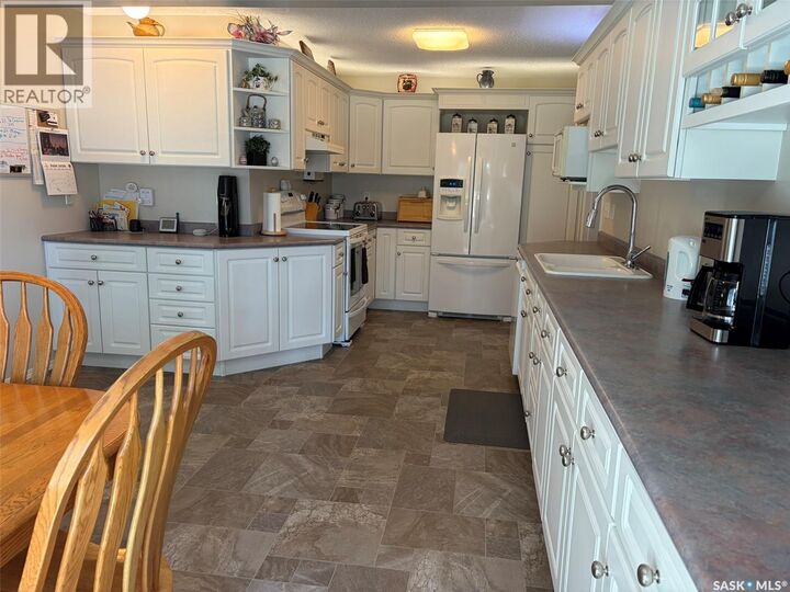 Property Photo:  310 34th Street W  SK S6V 8B8 