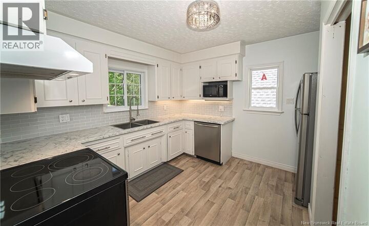 Property Photo: 16 Stonehurst Avenue NB E3C 1H1