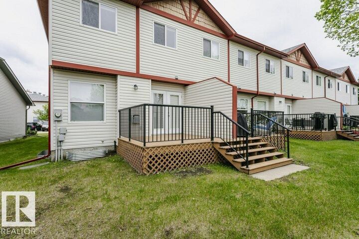 Property Photo:  15 Woodsmere Close 21  AB T8L 4S2 