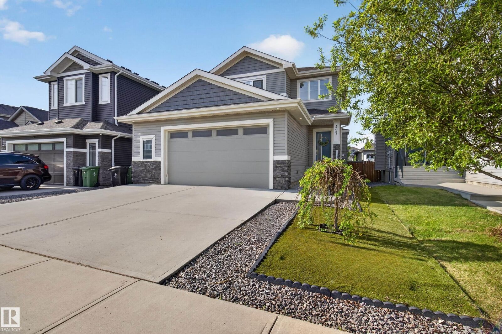 Property Photo:  457 Meadowview Drive  AB T8L 0N9 