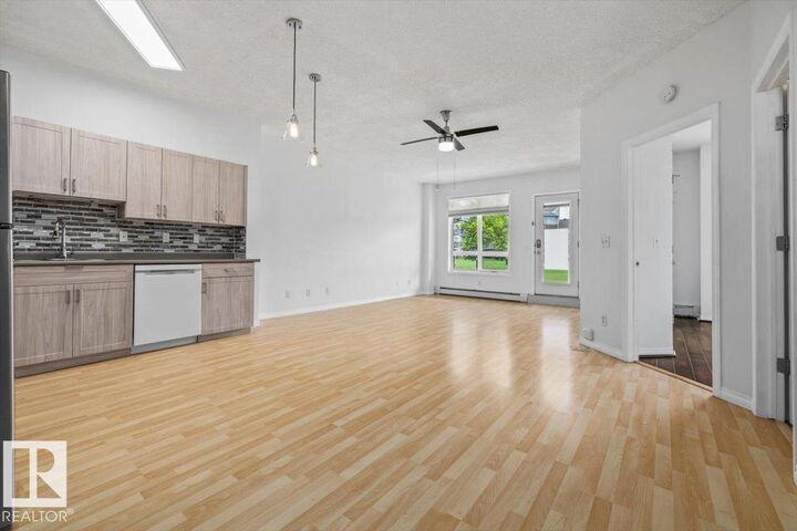 Property Photo: 6315 135 Avenue NW 116 AB T5A 5J7