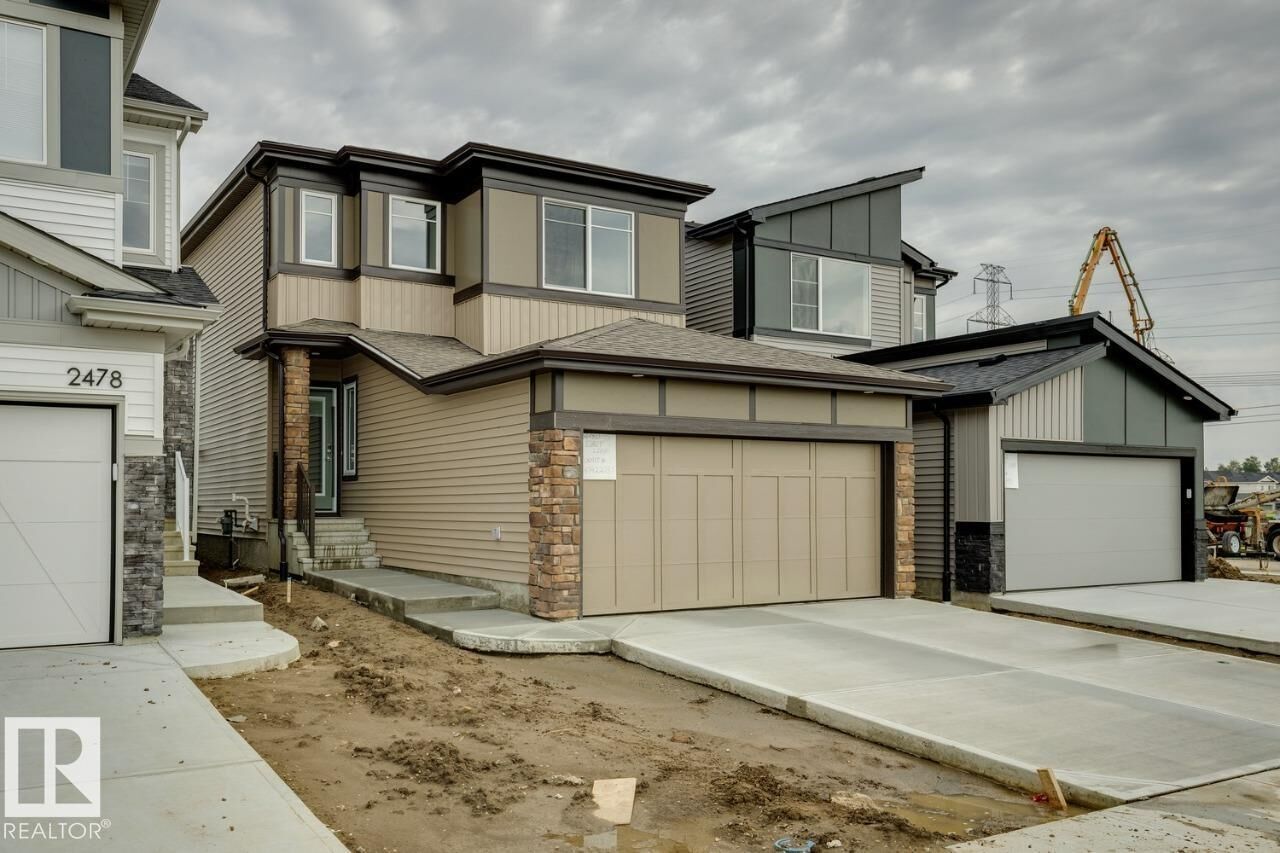 Property Photo: 2480 Egret Loop NW AB T6M 3R4