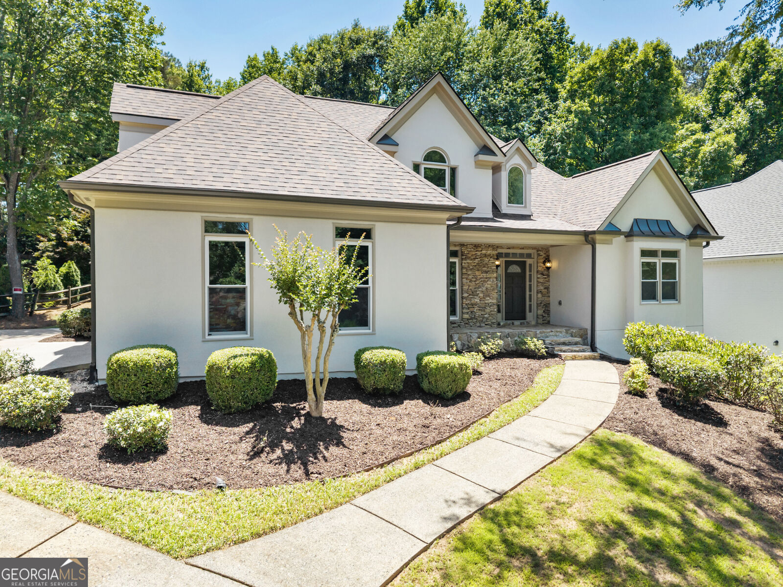 Property Photo: 9890 Groomsbridge Road GA 30022