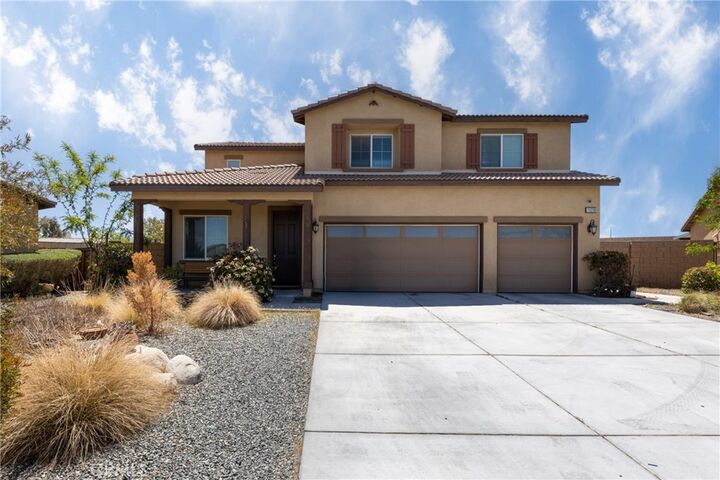 Property Photo:  11239 Scarlet Ave  CA 92301 
