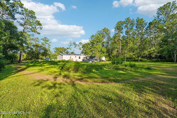 Property Photo:  9935 Amos Avenue  FL 32145 