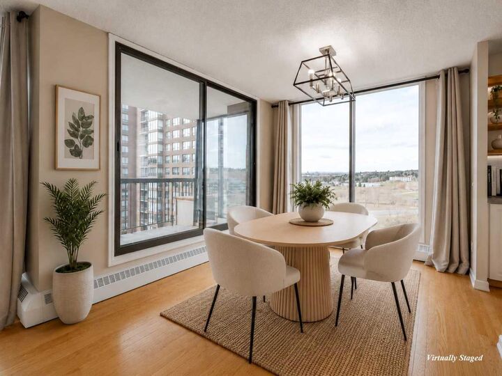 Property Photo:  145 Point Drive NW 1002  AB T3B 4W1 