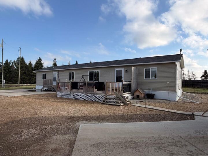 Property Photo:  305600A Range Road 254  AB T0M 1J0 