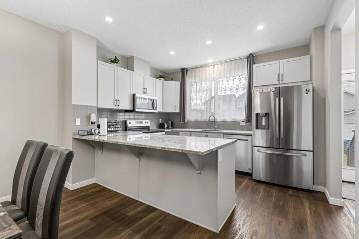 Property Photo: 291 Magnolia Square SE AB T3M 2W6