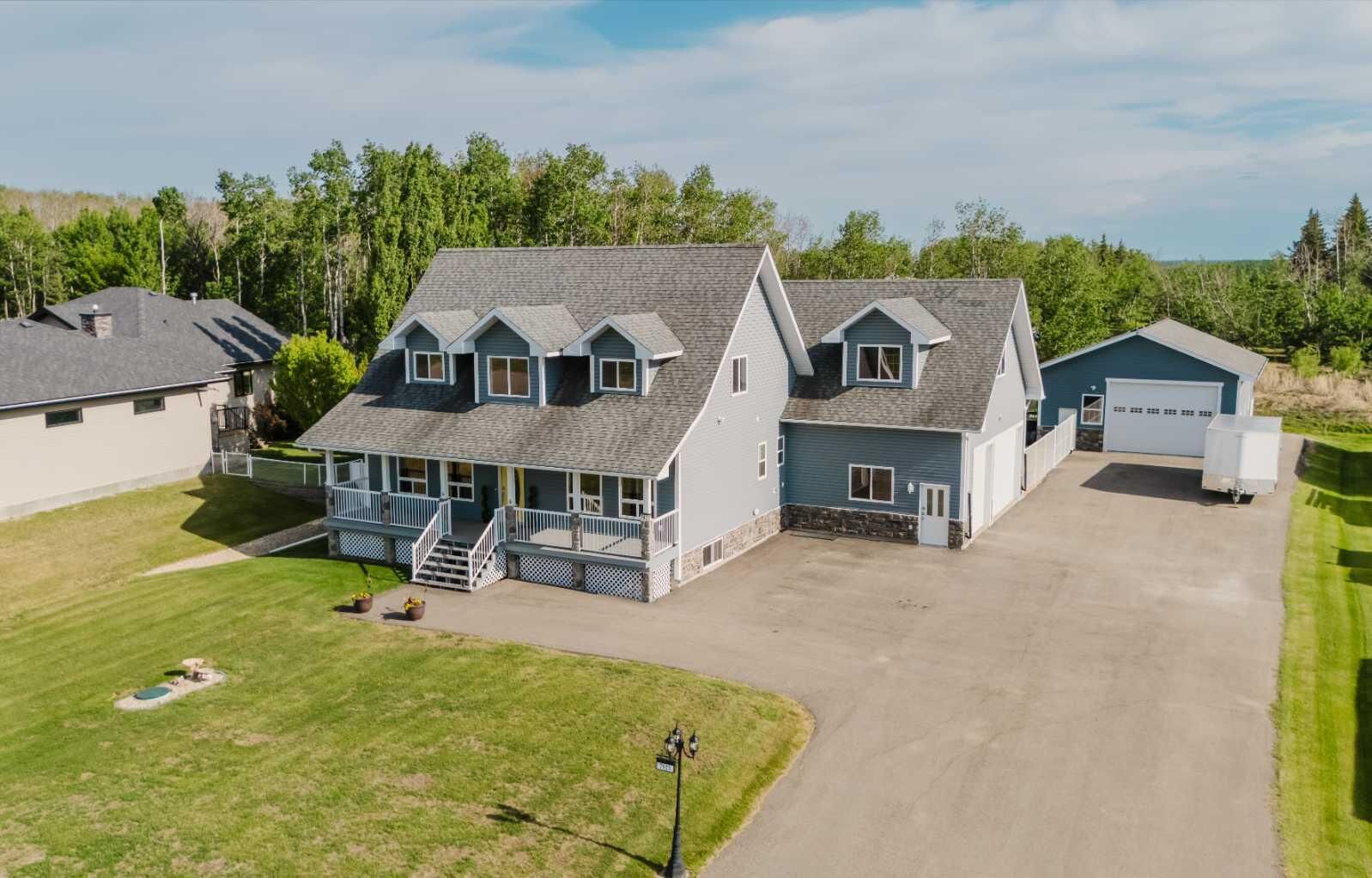 Property Photo: 7925 Carriage Lane Drive AB T8X 0G4