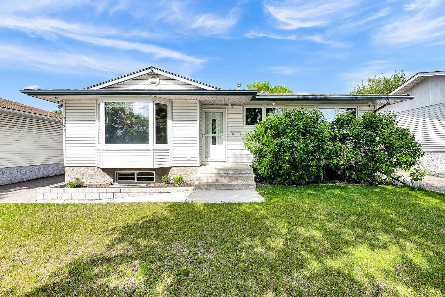 Property Photo:  7127 18 Street SE  AB T2C 1K2 