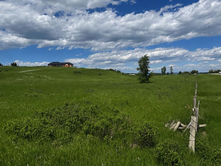 Property Photo: 32022 268 Avenue W AB T1S 5M7