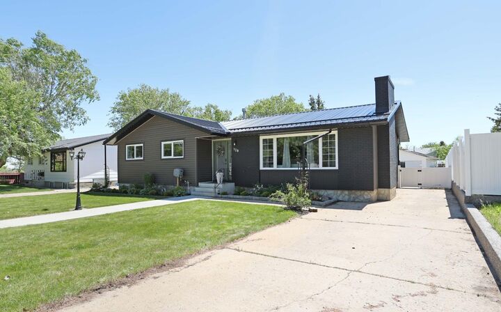 Property Photo: 120 Ingram Park Drive E AB T1R 0J9