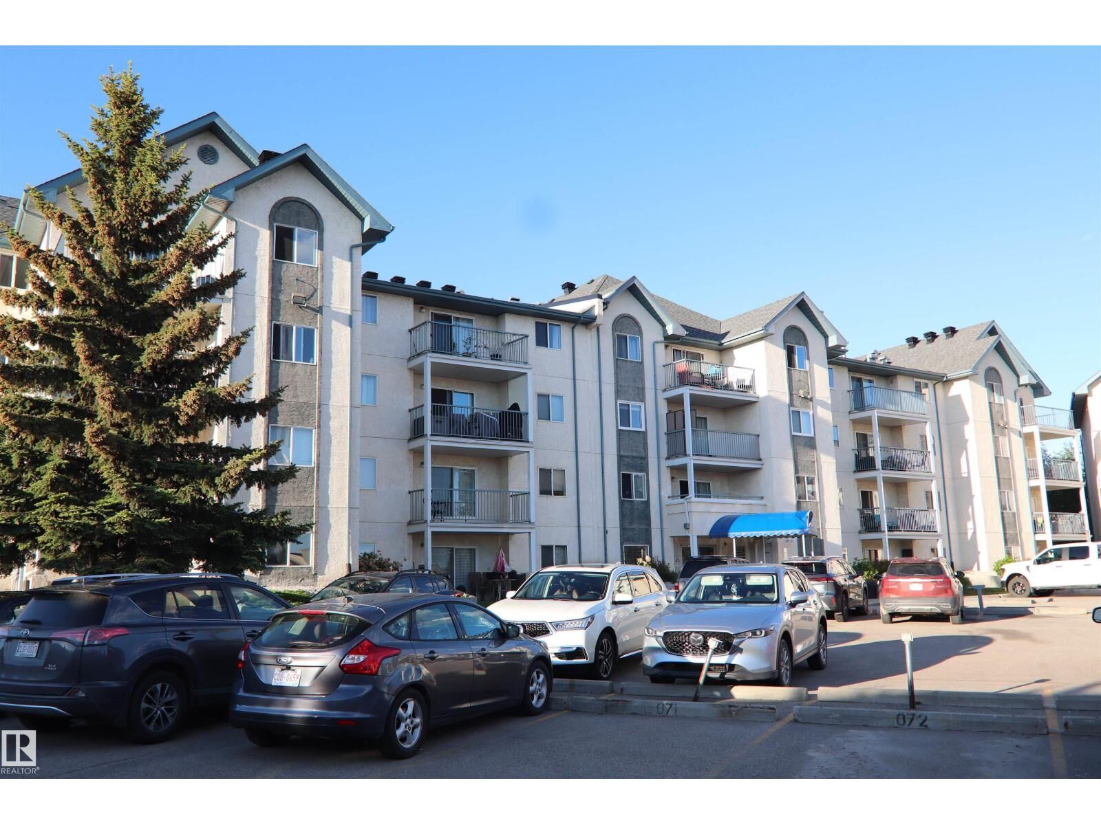 Property Photo: #421 6720 158 Av NW NW AB T5Z 3B1