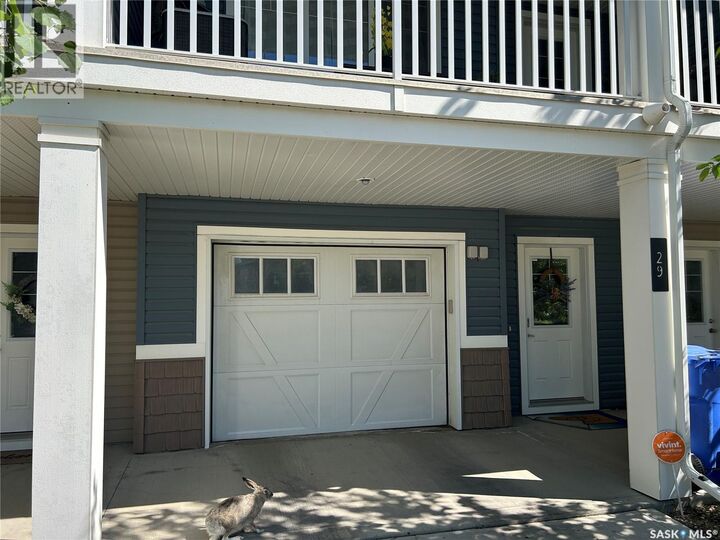 Property Photo: 29 4533 Delhaye Way SK S4W 0M2