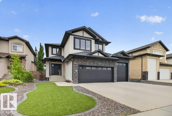 Property Photo: 5606 Rue Eaglemont AB T4X 0G9