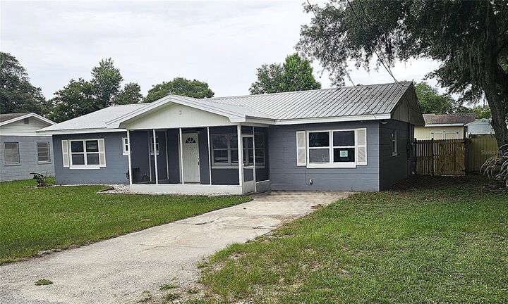 Property Photo: 314 Woodland Drive FL 32726