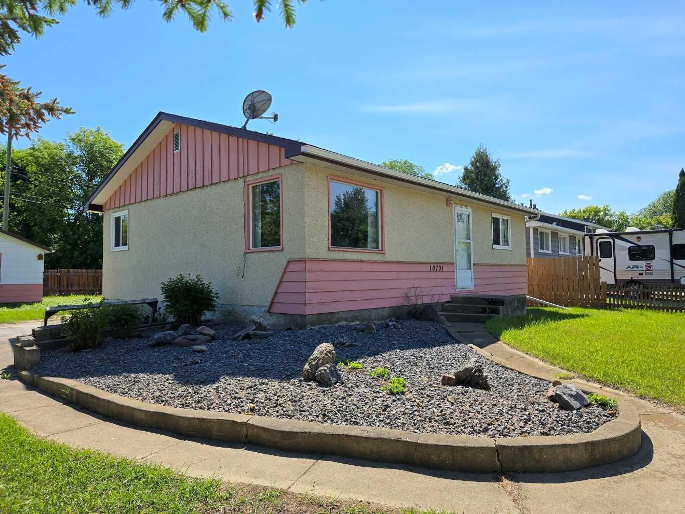 Property Photo: 10701 91 Street AB T8S 1R1