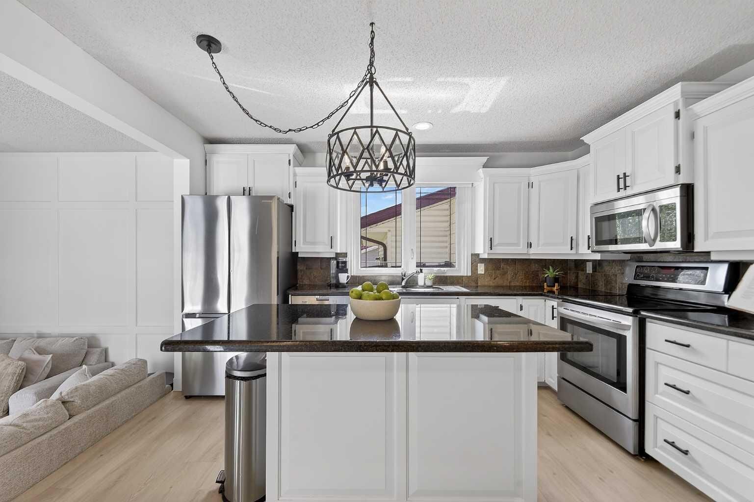 Property Photo: 240 Canniff Place SW AB T2W 2L8