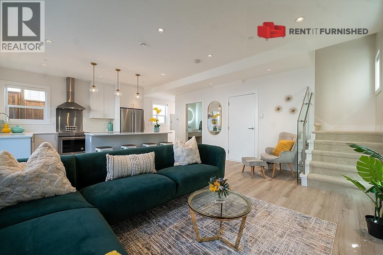 Property Photo:  3143 East 8th Avenue  BC V5M 1X5 