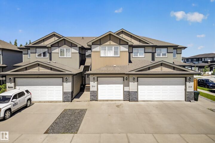 Property Photo:  311 Genesis Vi  AB T7Z 0J6 