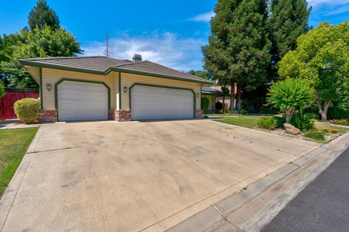 Property Photo:  7090 Emerald Street  CA 93610 