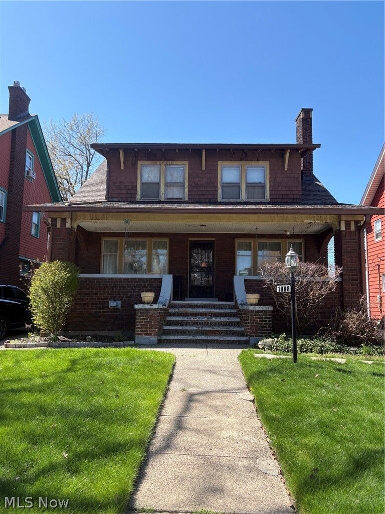 Property Photo: 1068 E 98th Street OH 44108