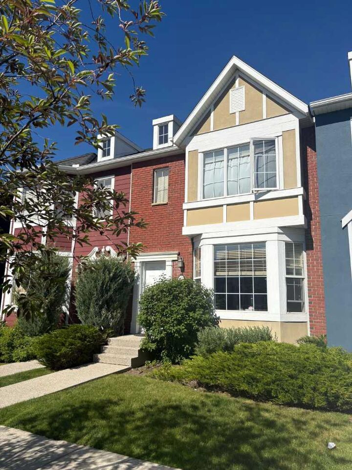 Property Photo: 233 Rainbow Falls Drive AB T1X 0B1