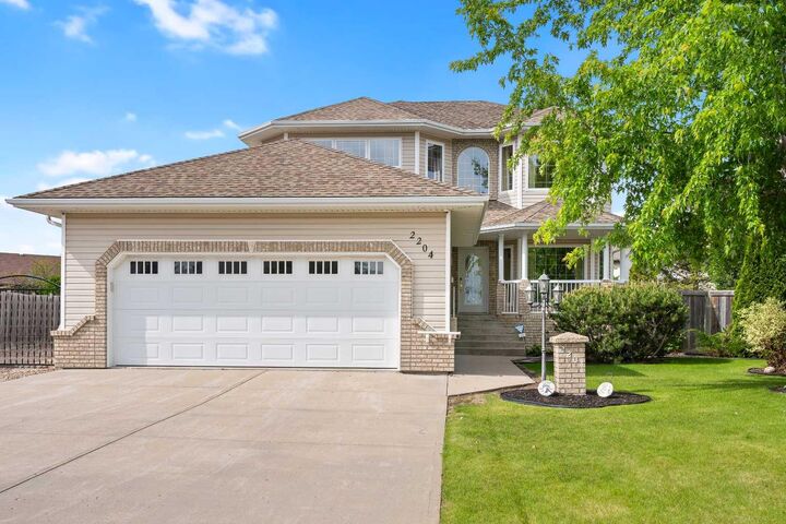 Property Photo: 2204 59A Avenue Close AB T9V 3J3