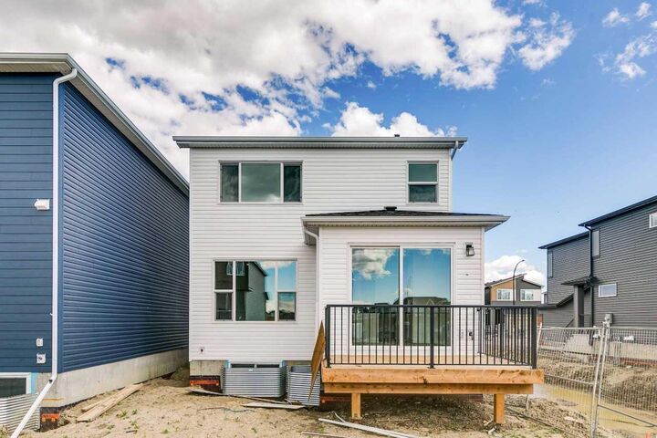 Property Photo:  41 Belmont Row SW  AB T2X 6E6 