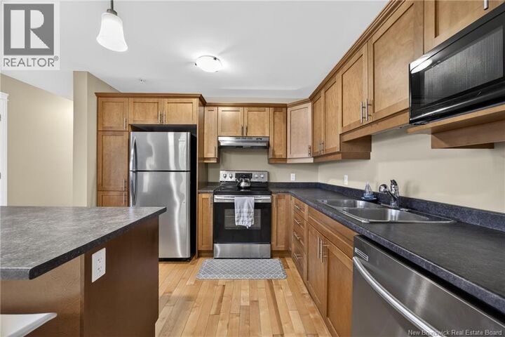 Property Photo:  65 Brayson Boulevard Unit# 204  NB E2V 0J2 