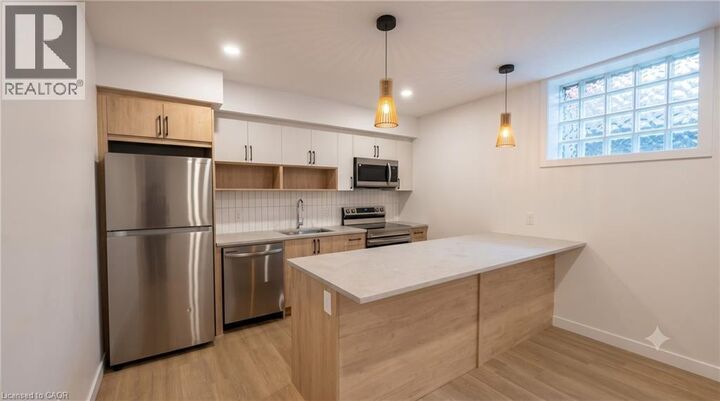 Property Photo:  15 Cedar Street North 5  ON N2H 2W7 