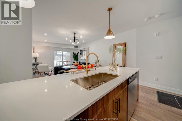 Property Photo:  11957 Tecumseh Road East 303  ON N8R 1L0 