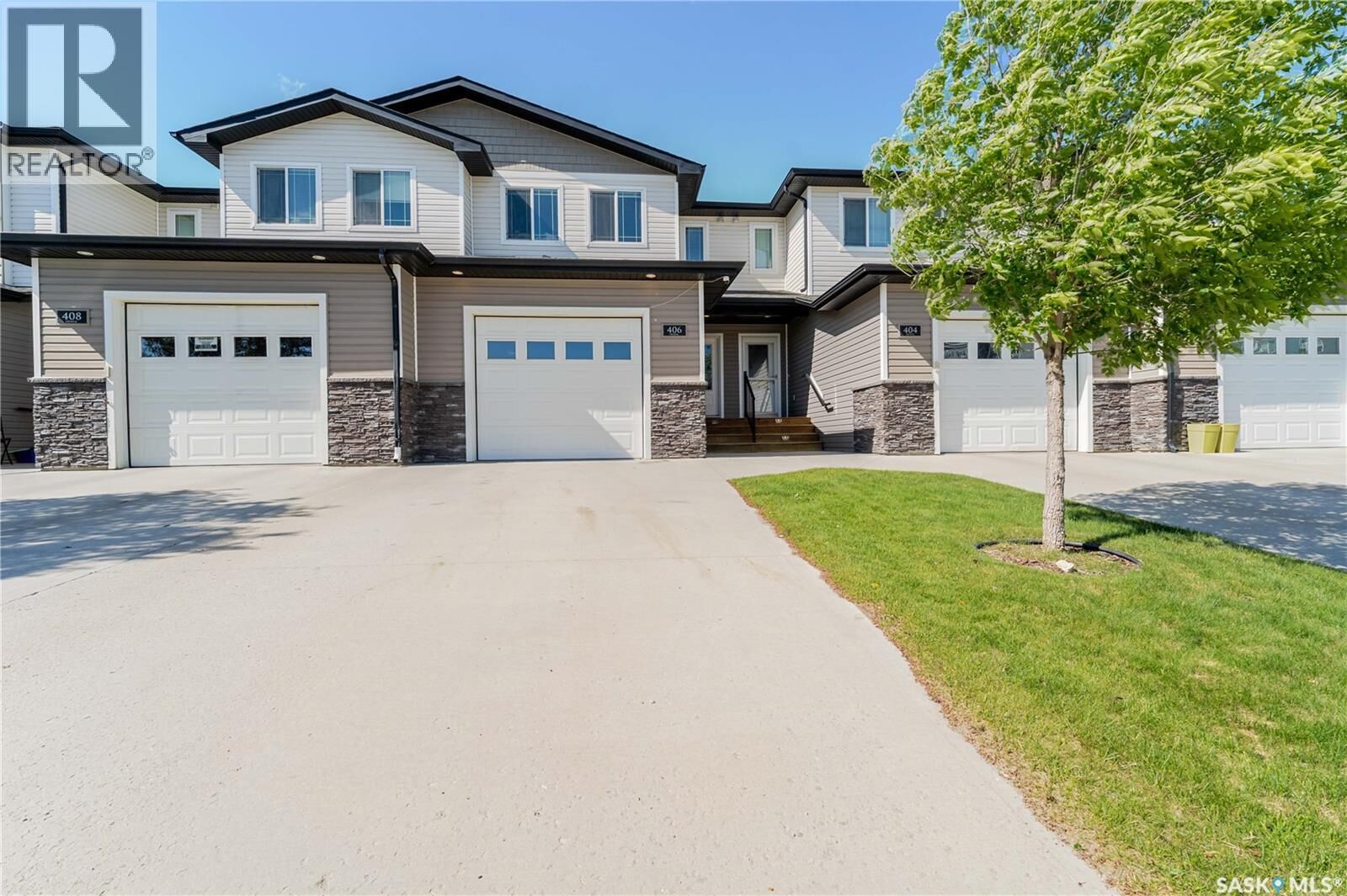 Property Photo:  406 940 Bradley Street  SK S6H 3M4 