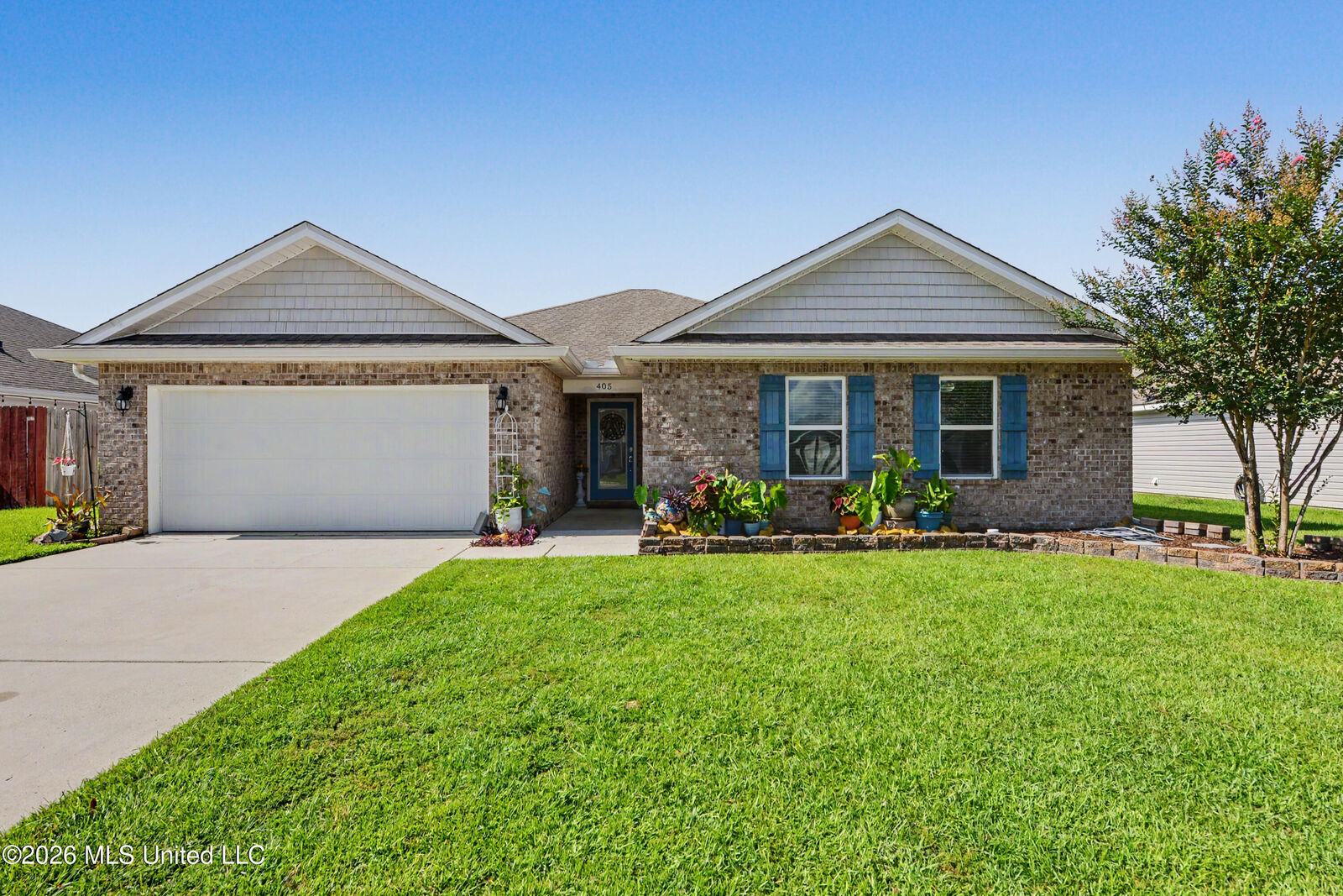 Property Photo:  405 E Petunia Drive  MS 39560 