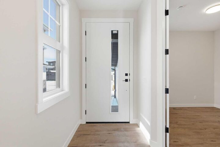 Property Photo:  302 Kinniburgh Loop  AB T1X 3C3 