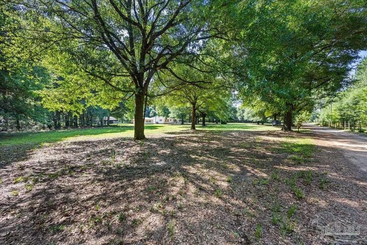 Property Photo:  12400 Wildlife Rd  FL 32564 