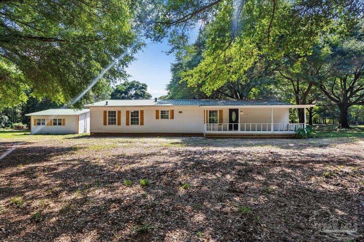 Property Photo:  12400 Wildlife Rd  FL 32564 