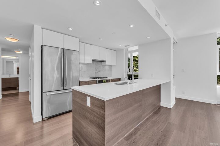 Property Photo: 8538 River District Crossing 203 BC V5S 0C9