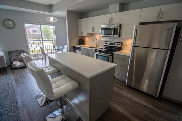 Property Photo:  100 Waterford Green Common  MB R2R 2X8 