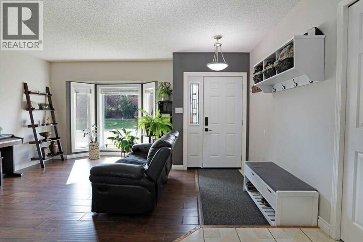 Property Photo: 65 Parkland Way East AB T1R 0M6