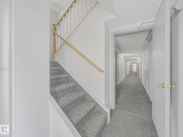Property Photo: 10324 119 Street NW 17 AB T5K 1Z6