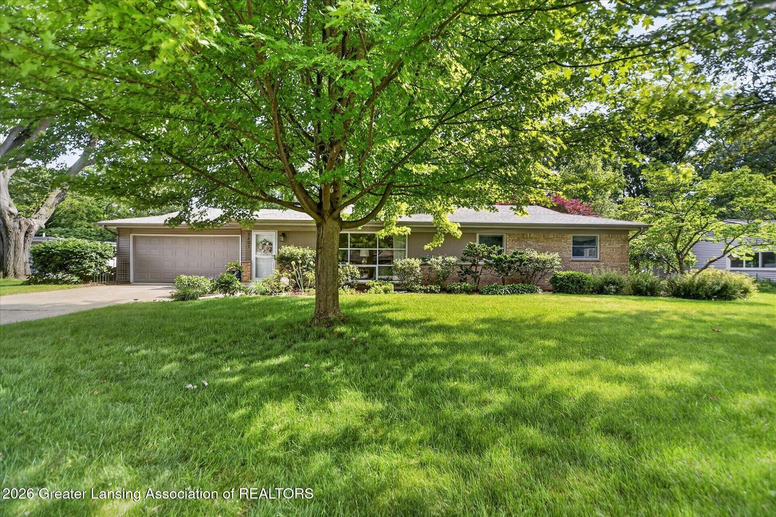 Property Photo:  2401 Shawnee Trail  MI 48864 