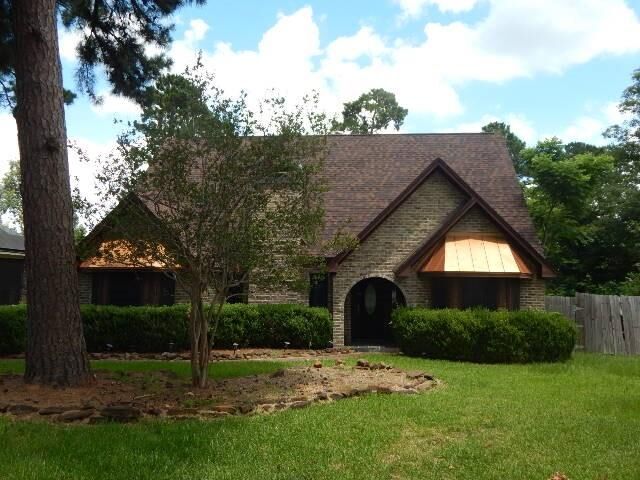 Property Photo: 12114 Hawthorne Drive TX 77356