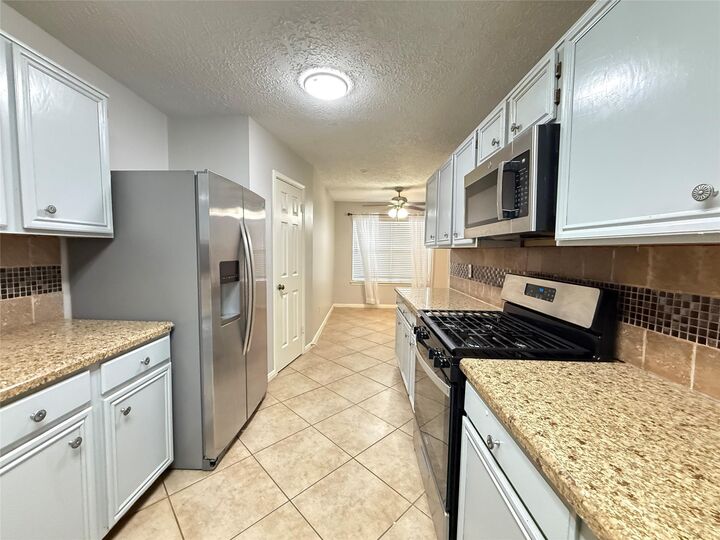 Property Photo: 9019 Autumnsong Drive TX 77064