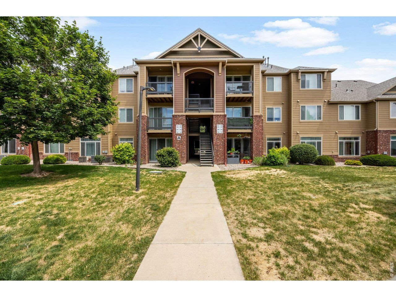 Property Photo:  2445 Windrow Dr A-301  CO 80525 