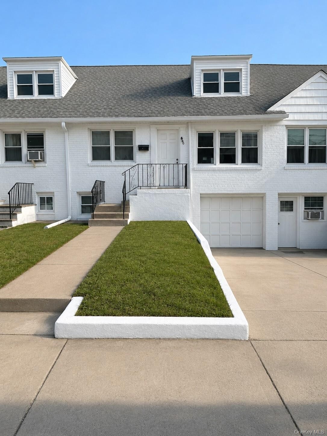 Property Photo: 660 W Broadway NY 11561