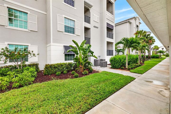 Property Photo:  43997 Boardwalk Loop 1841  FL 33982 