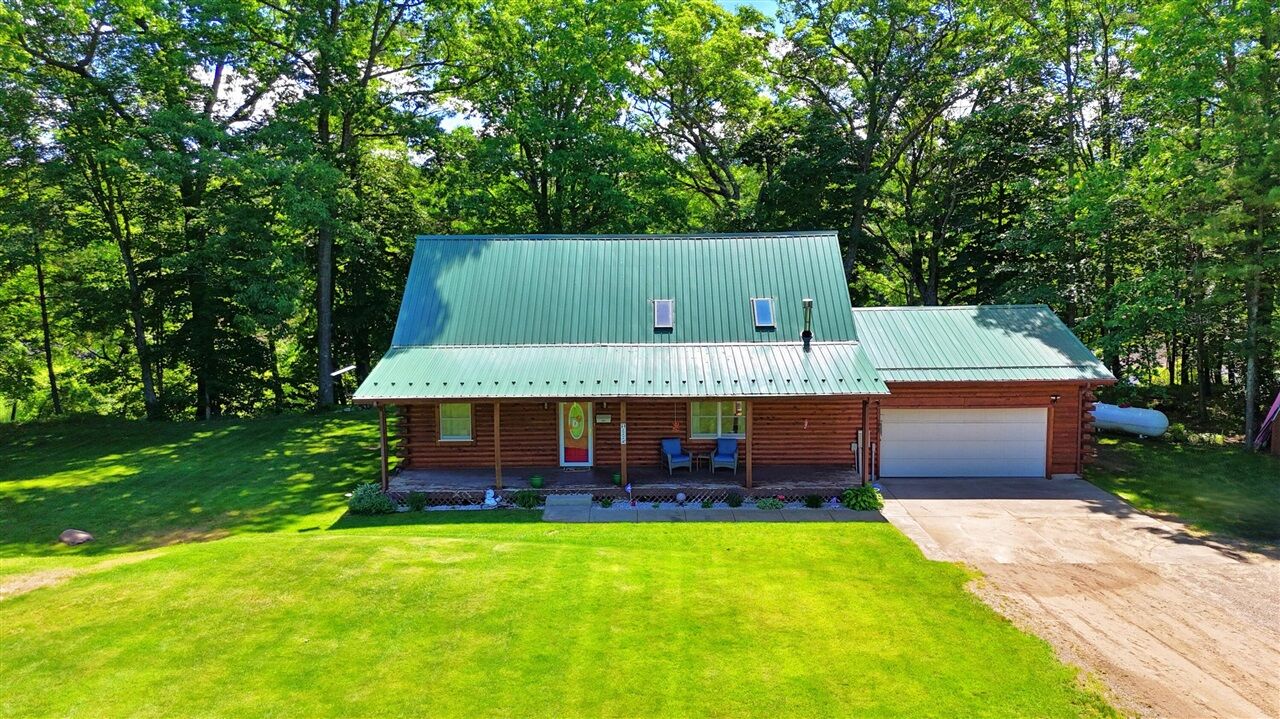 Property Photo:  18885 14 Mile Road  MI 49307-9497 